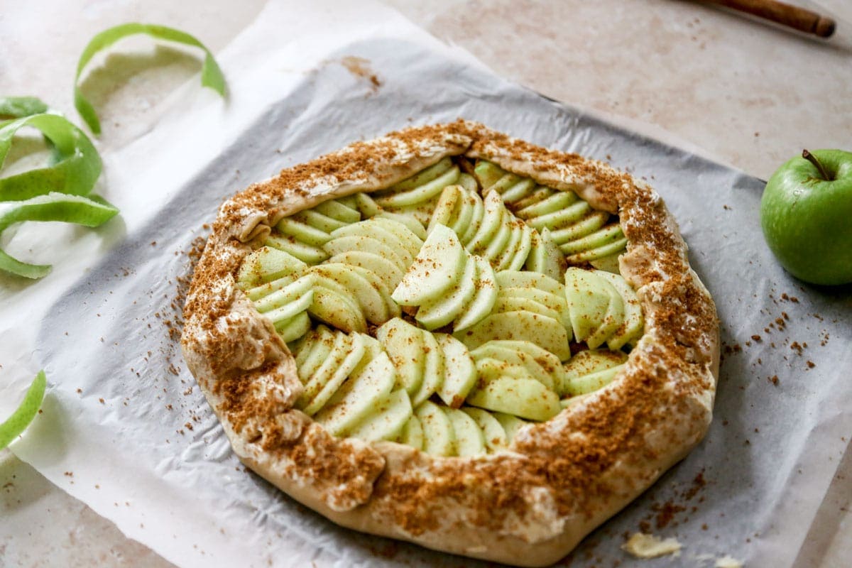 Image of plant based apple galette before it goes into the oven | cookingwithparita.com