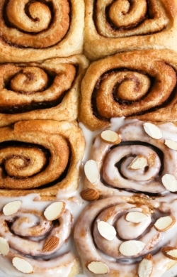 close up image of vegan triple almond cinnamon rolls | cookingwithparita.com
