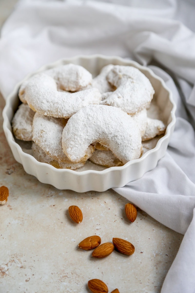 Image of Almond Vegan Vanillekipferl (German Vanilla Crescent Cookies) | cookingwithparita.com