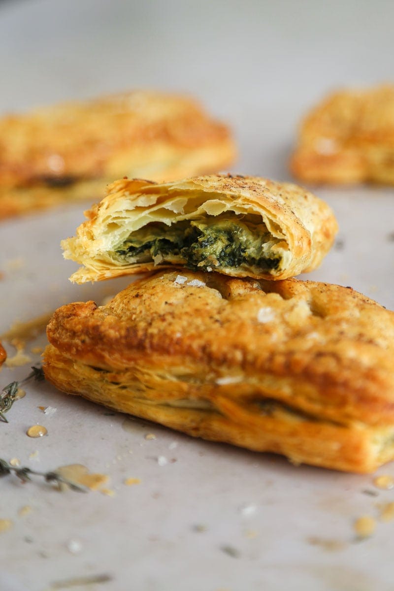 Image of inside vegan caramelised onion & cheesy spinach pastries | cookingwithparita.com