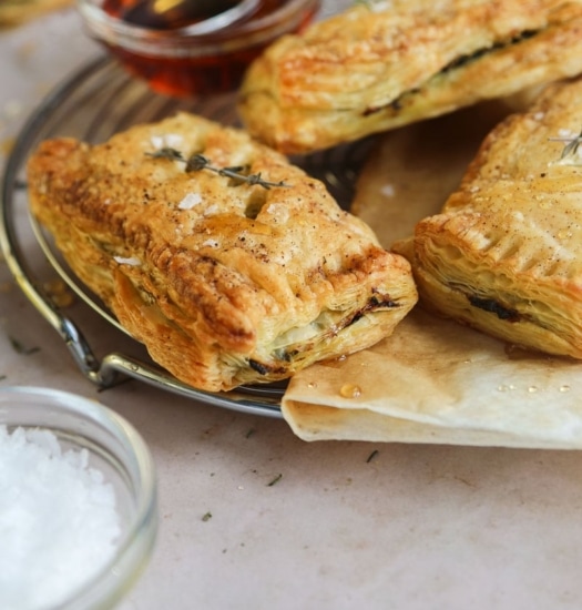 Image of Flaky vegan caramelised onion & cheesy spinach pastries | cookingwithparita.com