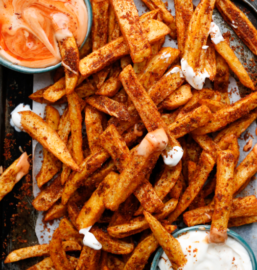 image of homemade peri peri fries recipe served with burger sauce